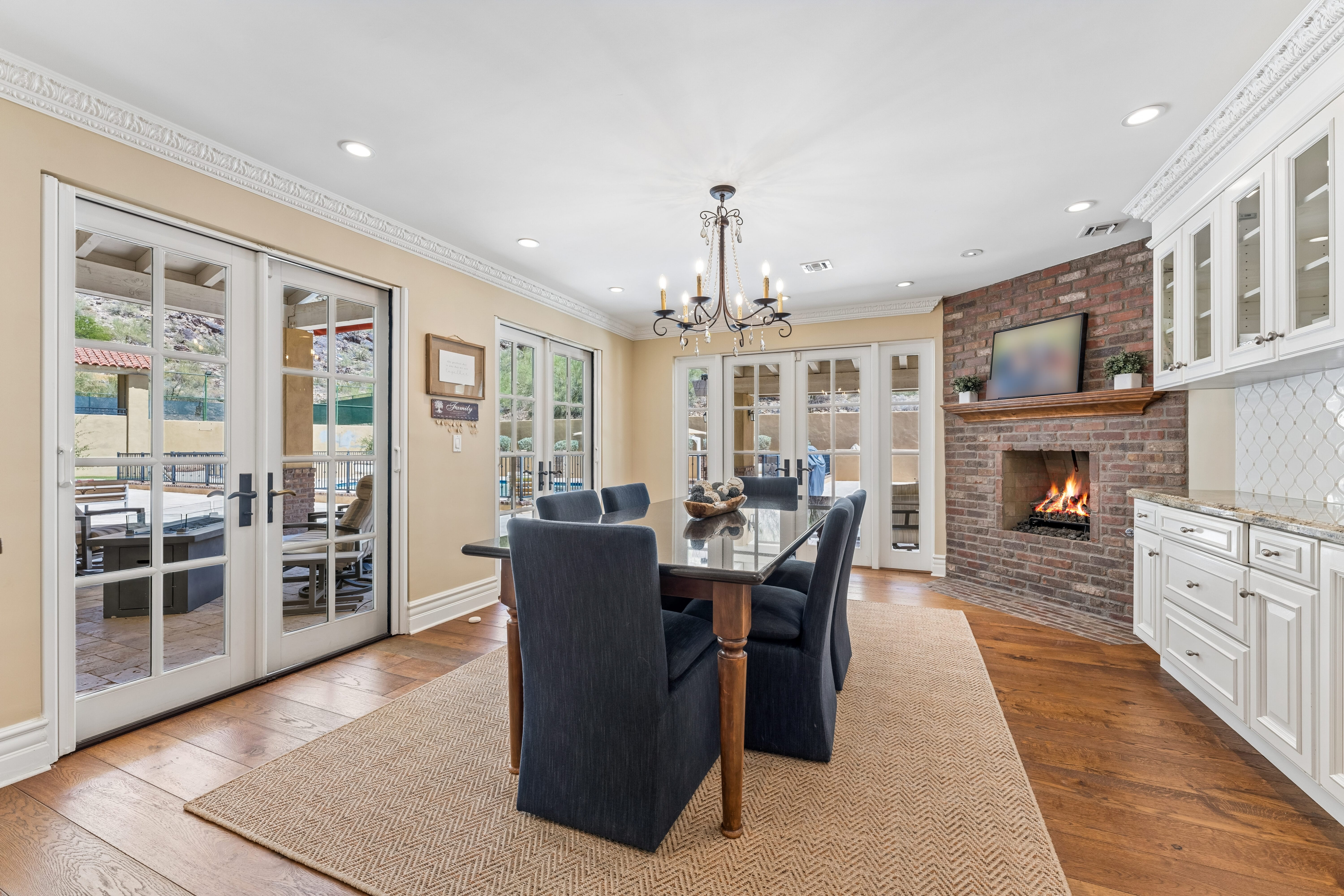 Breakfast nook with pool terrace beyond