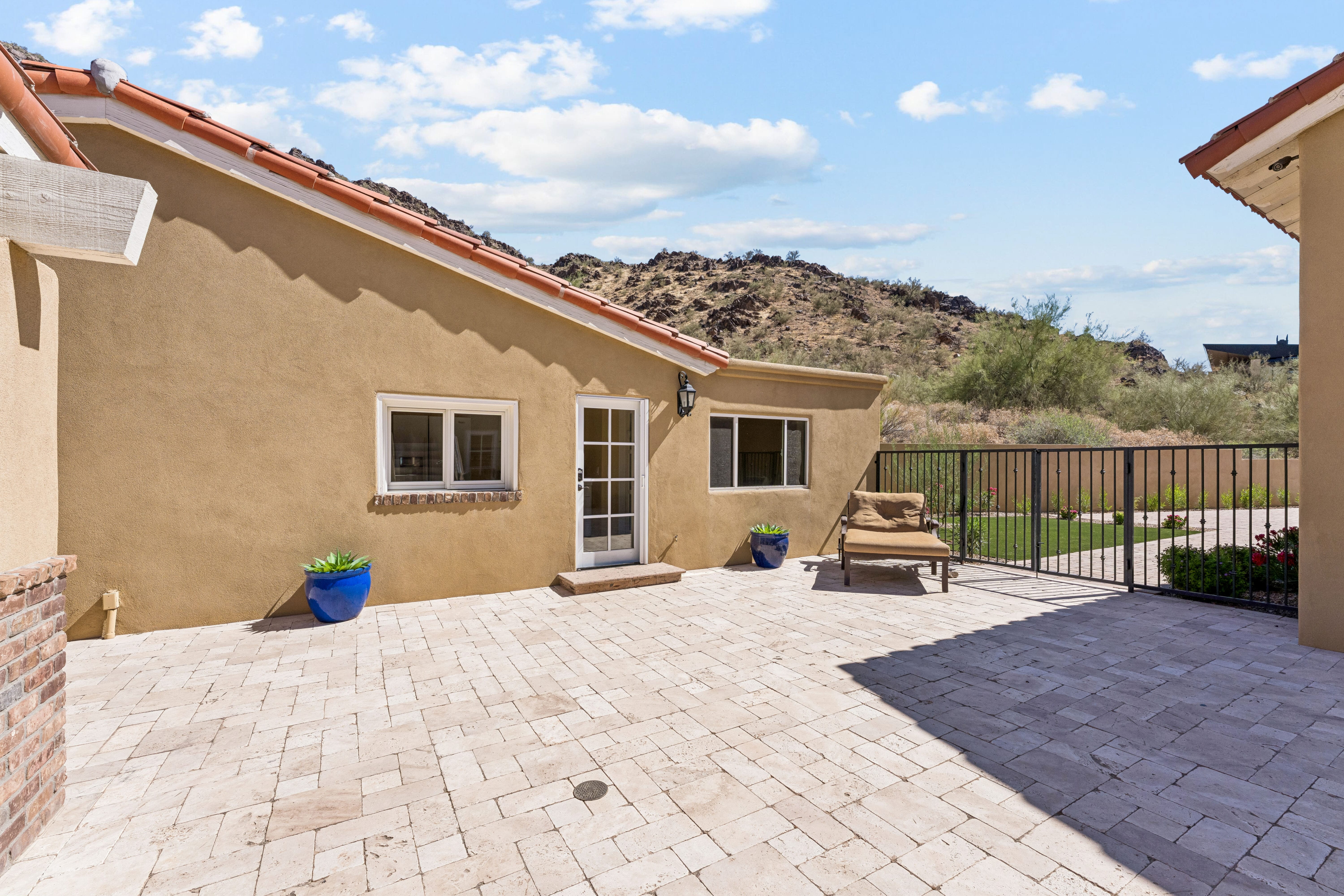 Upper terrace patio with mountain backdrop
