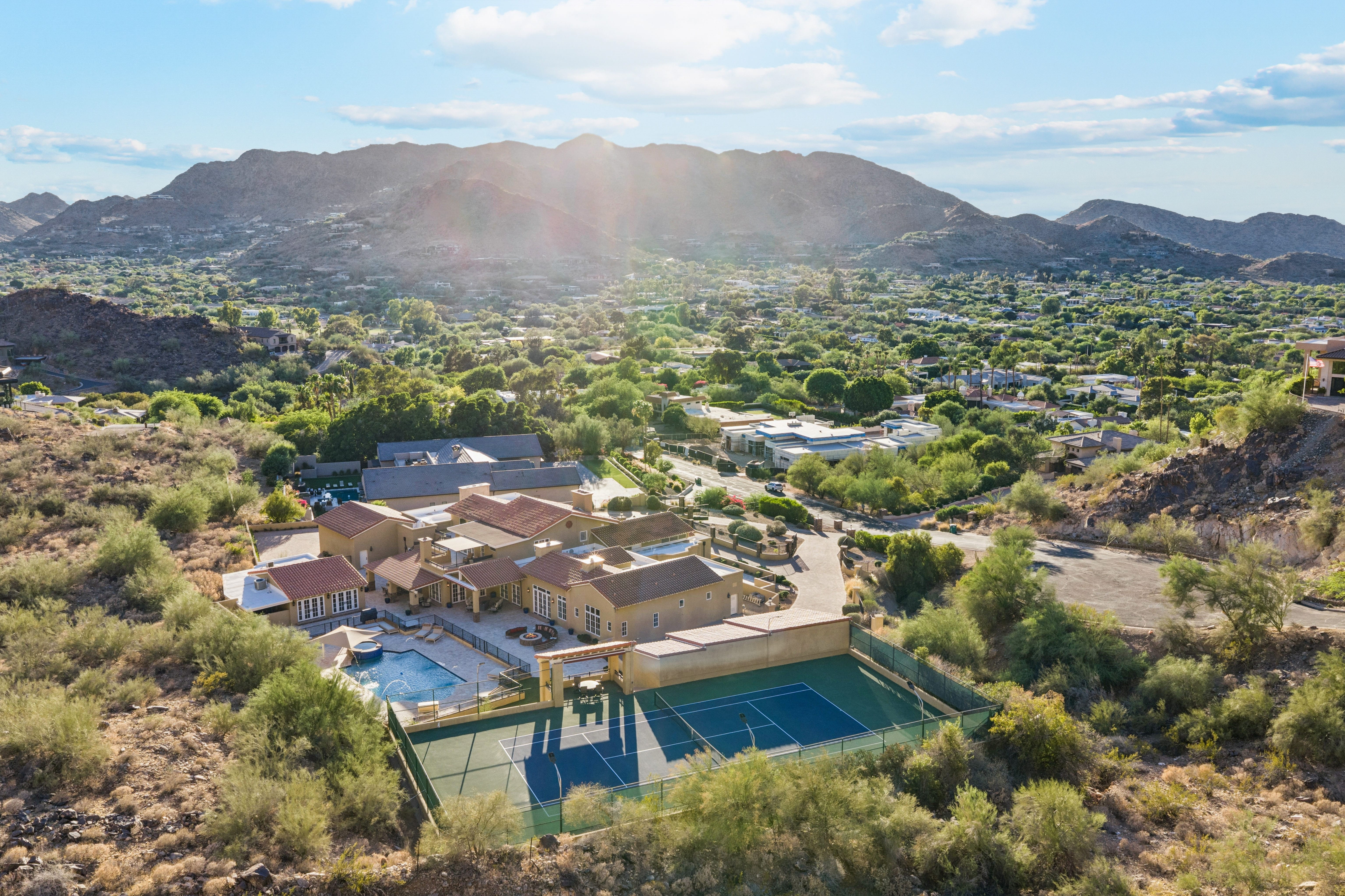 Aerial with mountain ridge and valley below