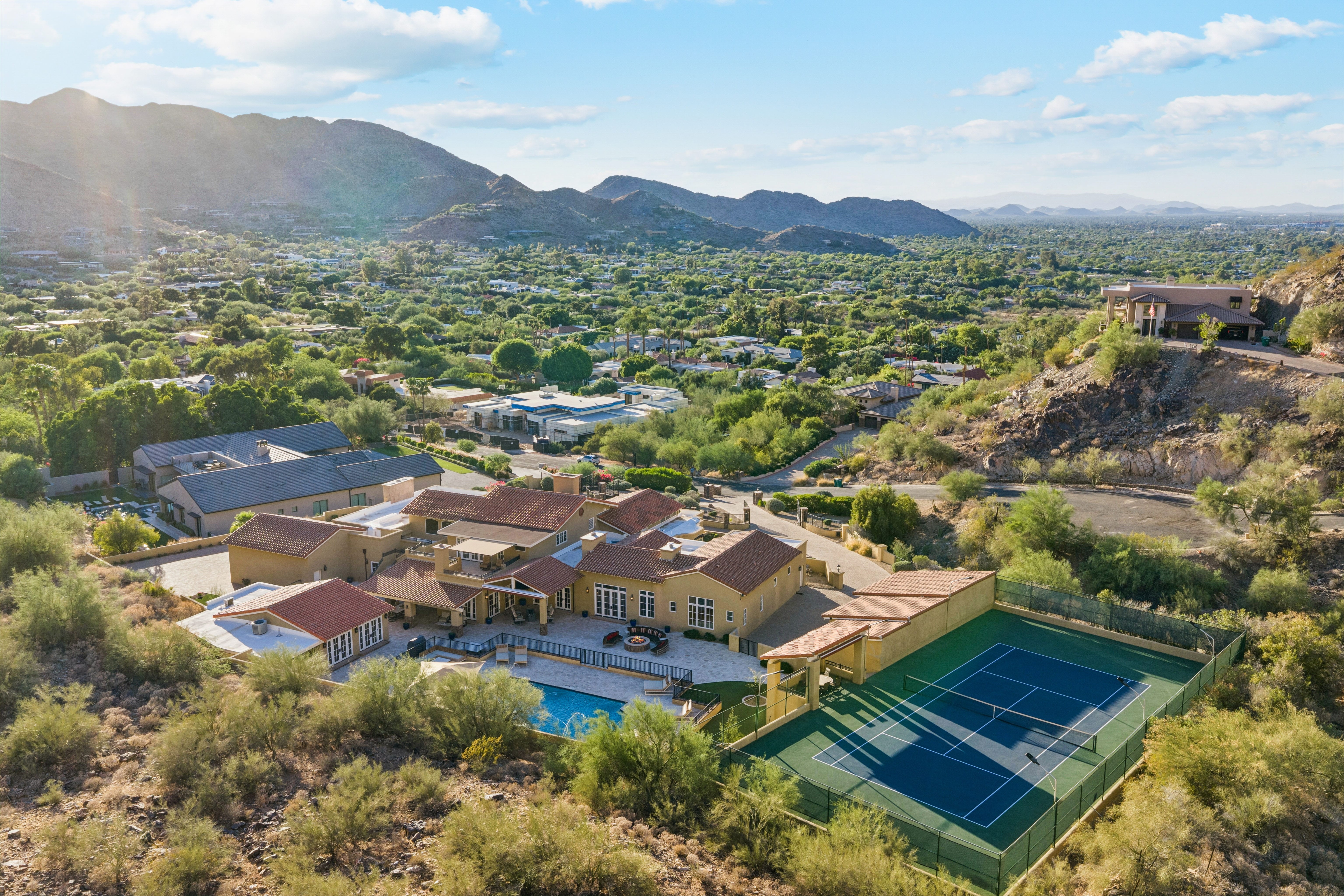 Wide aerial showing luxury estate in canyon landscape