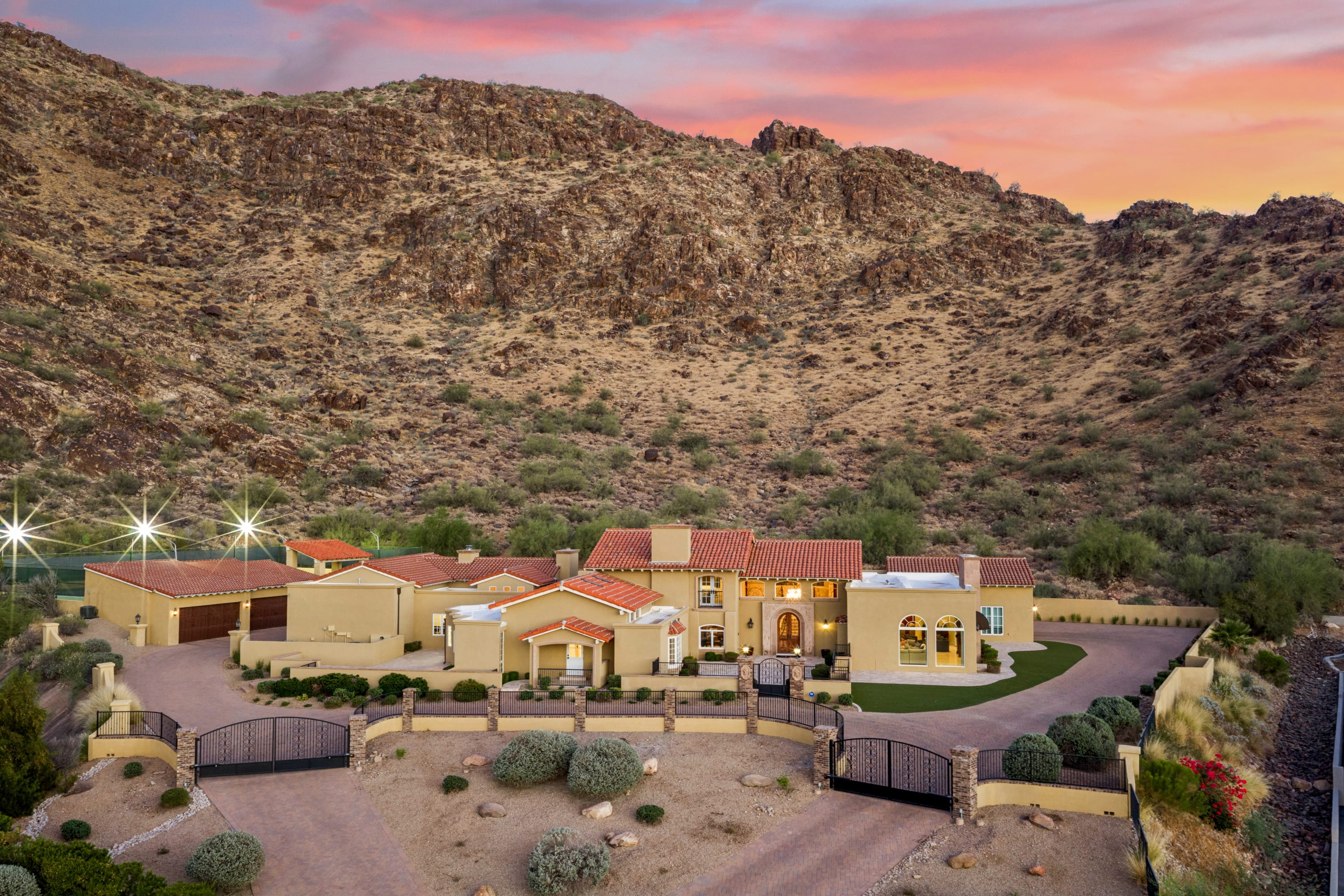 Twilight aerial of Grand Desert Mountain Retreat, Paradise Valley AZ